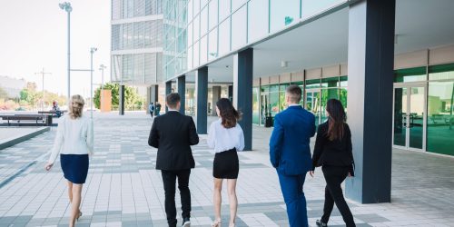 business-team-walking-street