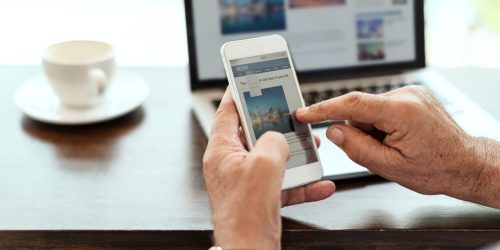 elderly-man-is-using-mobile-phone elderly-man-is-using-mobile-phone