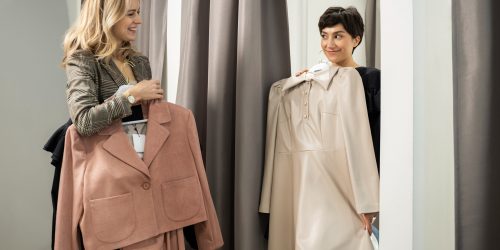 medium-shot-women-holding-clothes